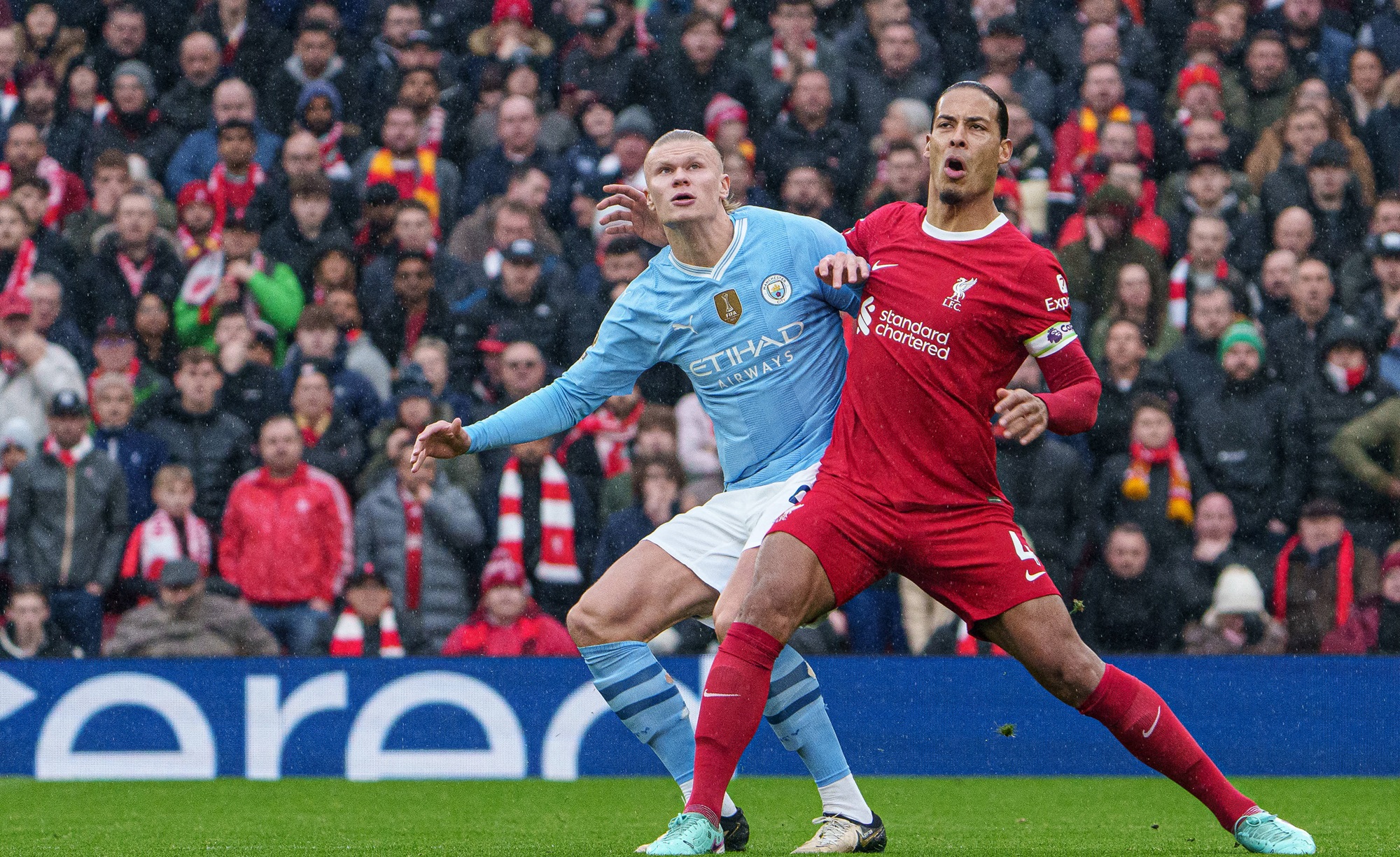 Erling Haaland e Virgil Van Dijk