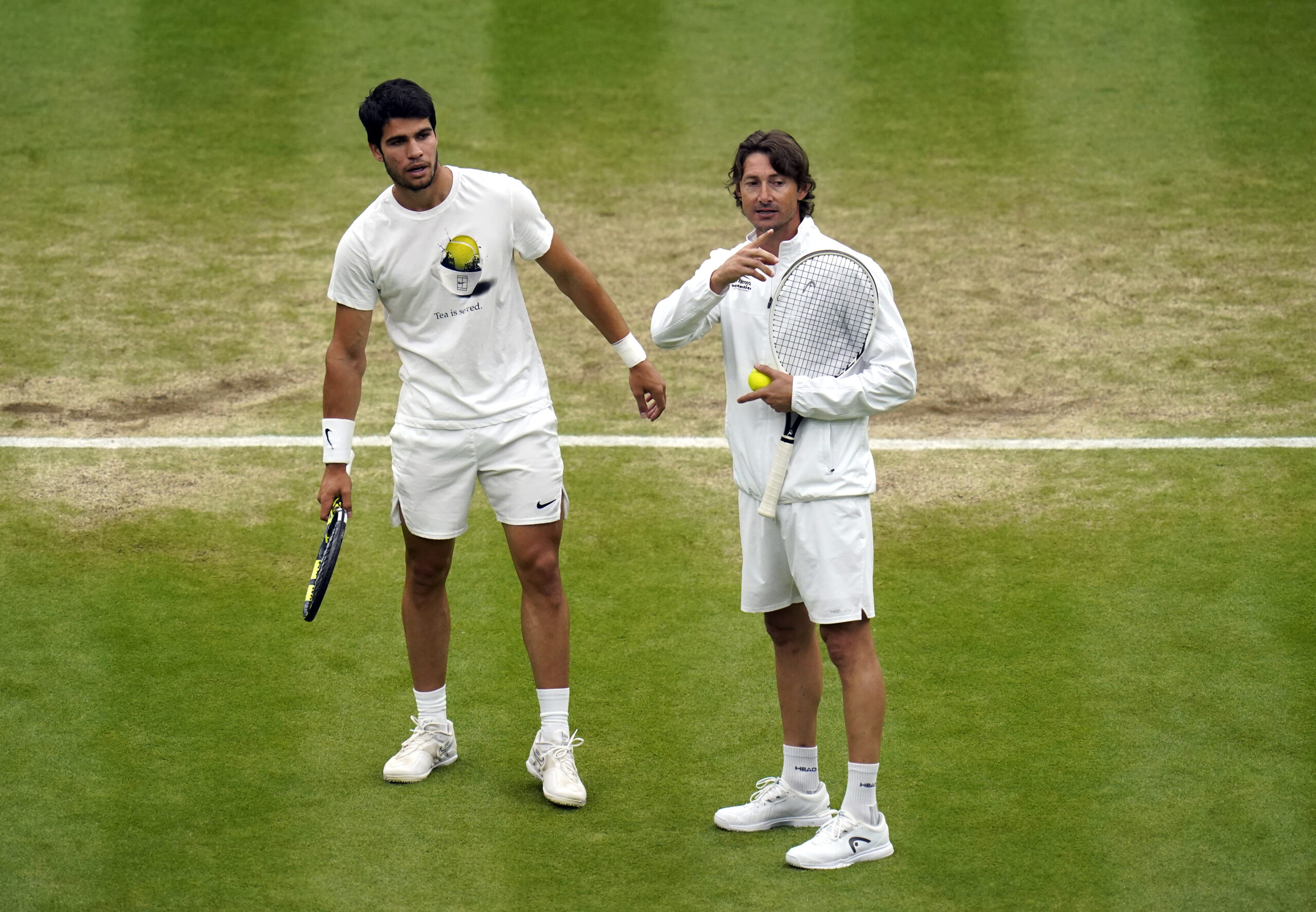 Carlos Alcaraz and Carlos Ferrero File Photo