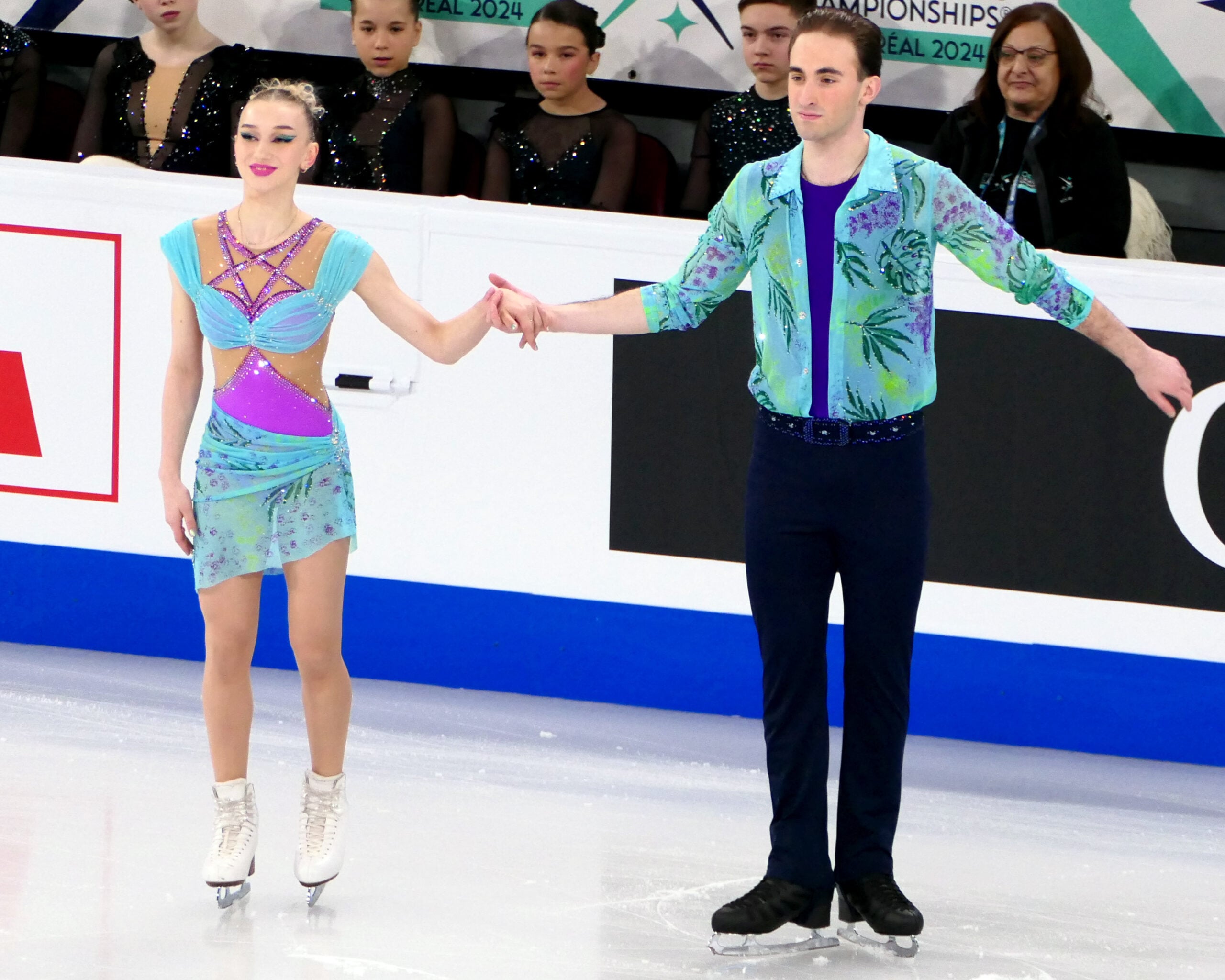 Perform in the pairs short program at the 2024 World Figure Skat